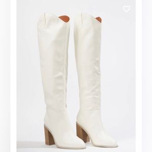 White knee high boots